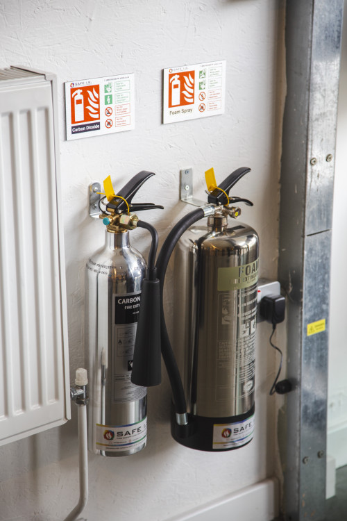 Fire extinguisher maintenance and servicing for school buildings